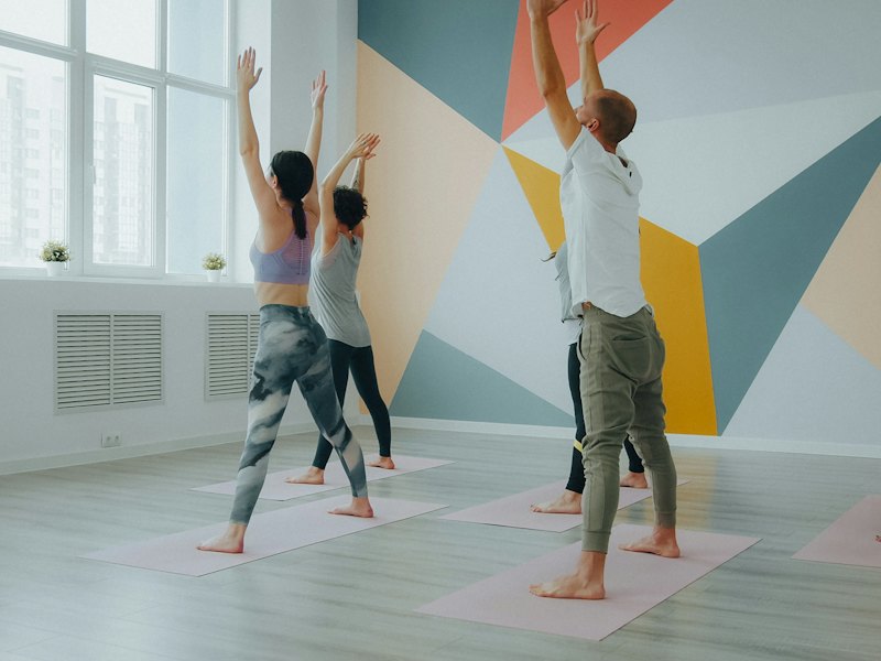 Yoga class in a bright studio